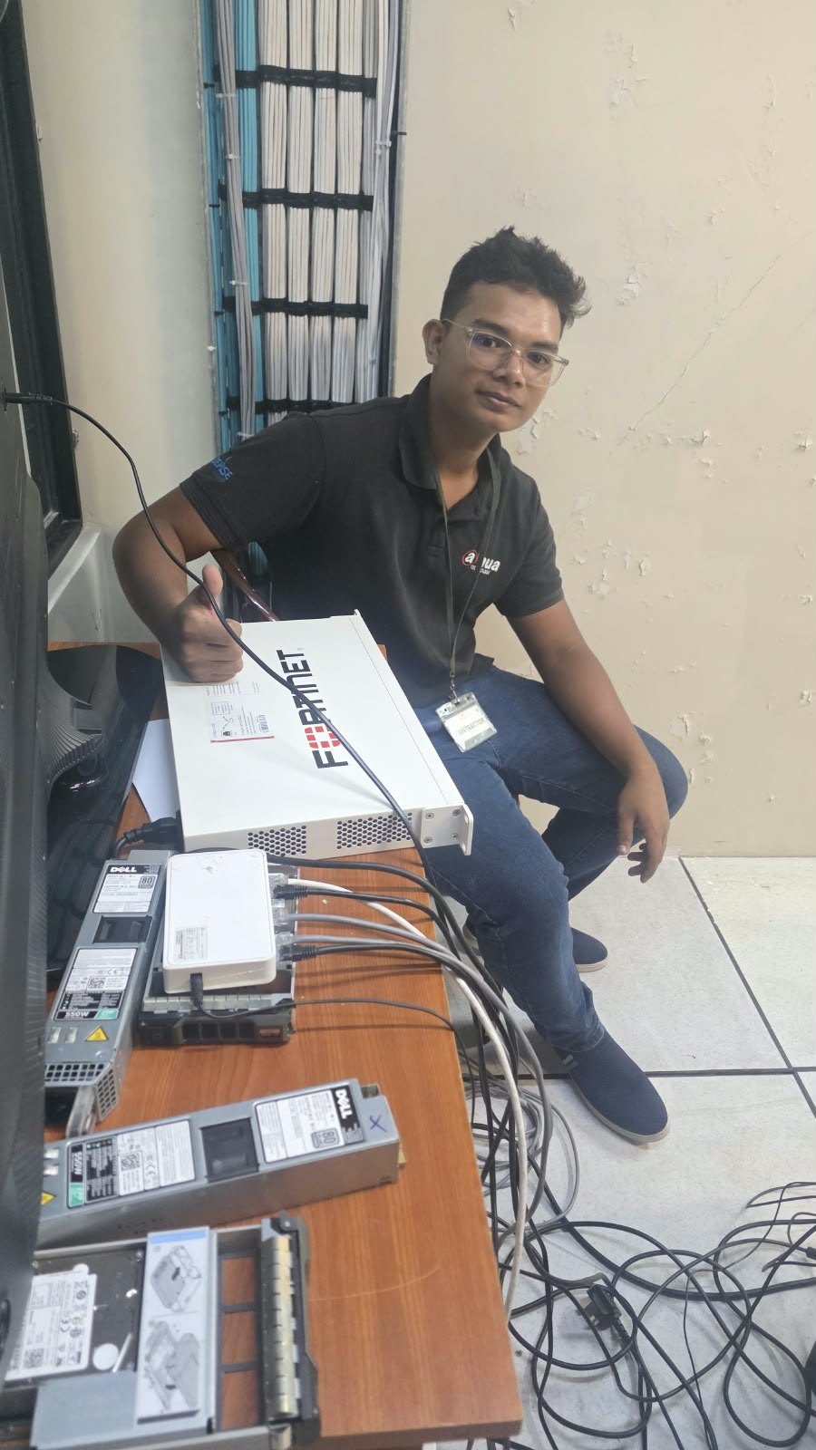 Technician configuring enterprise network equipment